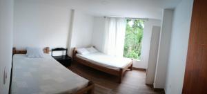 Cabaña en la CRISTALINA San Rafael embrujo de aguas cristalinaa