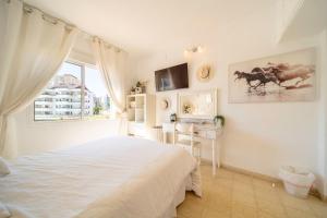 Sun-Drenched, Sea-View Apartment with Giant Patio!