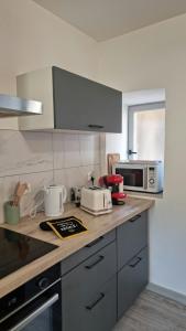 Appartements T3 au Centre de Gourdon : photos des chambres