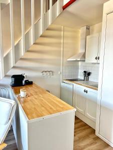 Aux beaux coquillages, vue mer et sur le port