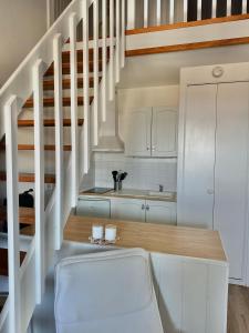 Appartements Aux beaux coquillages, vue mer et sur le port : photos des chambres