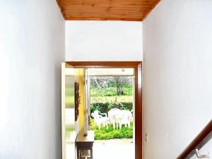 Charming house in Ourol with mountain view, large garden.