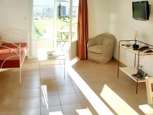 Maisons de vacances Maison charmante a Gallargues-le-Montueux avec piscine partagee : photos des chambres
