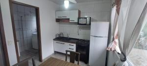 Perto da praia, tres suítes, cozinha, lavanderia e uma vaga de garagem coberta!