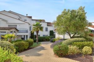 Maisons de vacances Maison charmante a Vaux-sur-Mer avec piscine partagee : photos des chambres