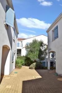 Maisons de vacances Maison charmante a Vaux-sur-Mer avec piscine partagee : photos des chambres