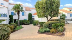 Maisons de vacances Maison charmante a Vaux-sur-Mer avec piscine partagee : photos des chambres