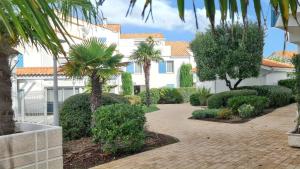 Maisons de vacances Maison charmante a Vaux-sur-Mer avec piscine partagee : photos des chambres