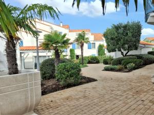 Maisons de vacances Maison charmante a Vaux-sur-Mer avec piscine partagee : photos des chambres