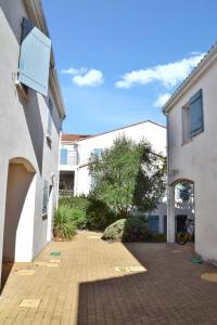Maisons de vacances Maison charmante a Vaux-sur-Mer avec piscine partagee : photos des chambres
