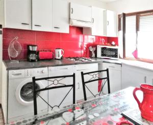 Appartements Appartement charmant a Villeneuve avec jardin : photos des chambres