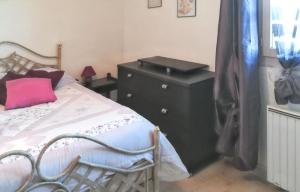 Appartements Appartement charmant a Villeneuve avec jardin : photos des chambres