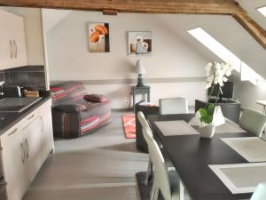 Appartements Appartement charmant a La Ferriere-aux-Etangs avec jacuzzi - 42 m² : photos des chambres