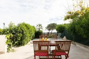 Baconer - Casa en l'Ampolla con jardín privado y acceso directo al mar - Deltavacaciones - L'Ampolla