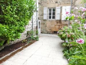 Maisons de vacances Maison charmante en Correze avec jardin et cheminee : photos des chambres