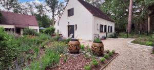 Maison de charme à Arbonne-la-Forêt avec terrasse-jardin verdoyant
