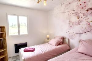 Maisons de vacances Maison chaleureuse a Fossemagne avec jardin et terrasse : photos des chambres