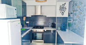 Appartements Appartement confortable a Raismes - 60 m², parking prive : photos des chambres