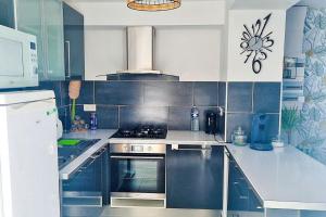 Appartements Appartement confortable a Raismes - 60 m², parking prive : photos des chambres