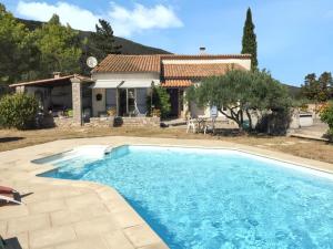 Villas Villa Charmante a Pompignan avec Piscine et Jardin : photos des chambres