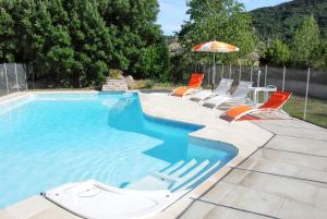 Villas Villa Charmante a Pompignan avec Piscine et Jardin : photos des chambres