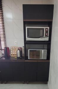 Casa da Sil com garagem, ar, wifi, perto Expocentro