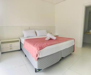 Rosa Condomínio Enseada lagos de Xangri-lá