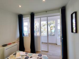 Maisons de vacances TY KER AOD - Villa superbe vue mer proche plage : photos des chambres