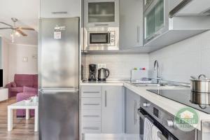 Sunny beachfront apartment with pool and aircon