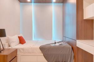 Warm and Homey 1BR at Brooklyn Alam Sutera Apartment By Travelio