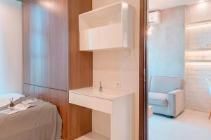 Warm and Homey 1BR at Brooklyn Alam Sutera Apartment By Travelio