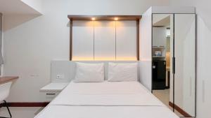 Comfort Studio Room at Vida View Apartment By Travelio