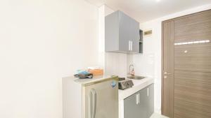 Best Deal and Restful Studio at Amazana Serpong Apartment By Travelio