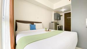 Best Deal and Restful Studio at Amazana Serpong Apartment By Travelio