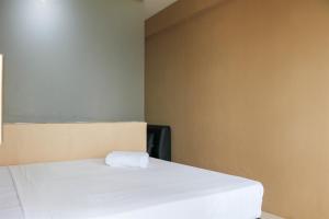 Modern and Nice Studio at Titanium Square Apartment By Travelio