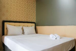 Modern and Nice Studio at Titanium Square Apartment By Travelio