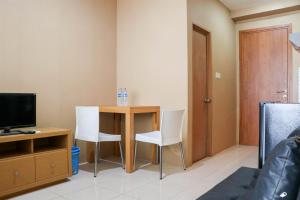 Modern and Nice Studio at Titanium Square Apartment By Travelio