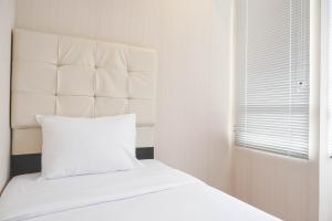 Combine 2BR at Cinere Bellevue Suites Apartment By Travelio