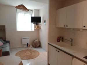 Appartements Studio remblai, port, commerces : photos des chambres