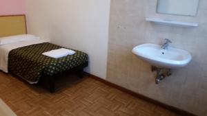 Camera Singola con Bagno in Comune