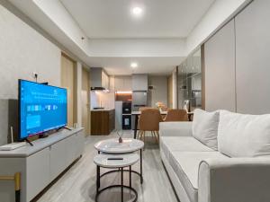 Homey and Modern Look 3BR at Meikarta with Balcon Apartment By Travelio
