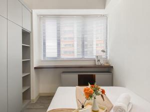 Homey and Modern Look 3BR at Meikarta with Balcon Apartment By Travelio