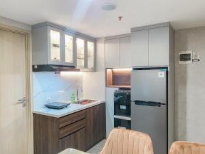 Homey and Modern Look 3BR at Meikarta with Balcon Apartment By Travelio