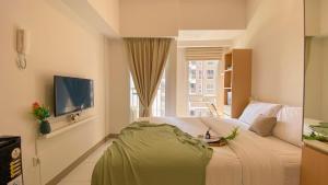 Simply & Comfy Studio Apartment at Tokyo Riverside PIK 2 By Travelio