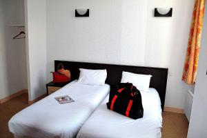 Hotels Hotel Les Benedictins : photos des chambres