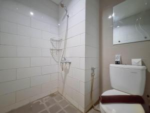 Homey and Good Studio Taman Melati Sinduadi Apartment By Travelio