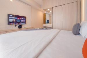 Good Deal and Spacious 3BR Sky House BSD Apartment By Travelio