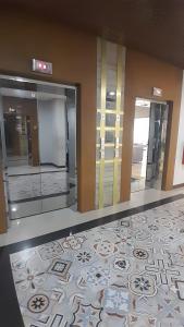 Cozy Apartment Room by Nia Apartment