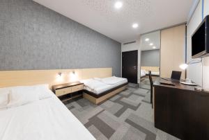 Family Room room in BNC Hotel - Restaurant - Bowling