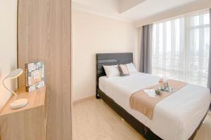 Elegant and Nice 2BR at Menteng Park Apartment By Travelio